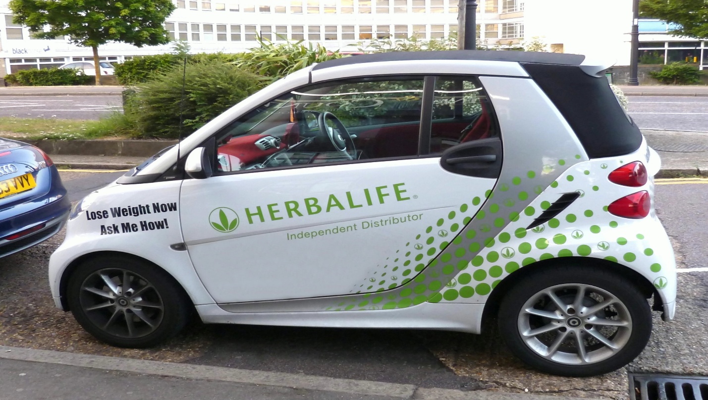 Car with herbalife label
