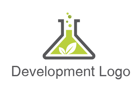 leaf with green substance bubbling in a flask