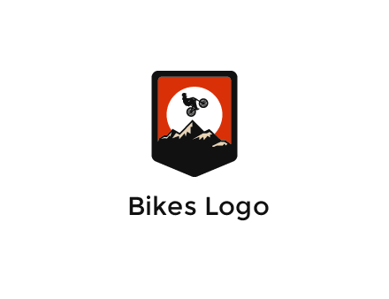 jumping bike and mountain emblem