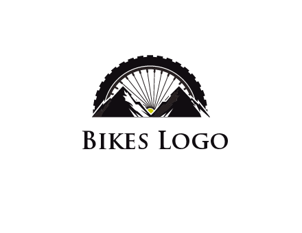 sun's rays forming a wheel behind mountains for a mountain biking logo